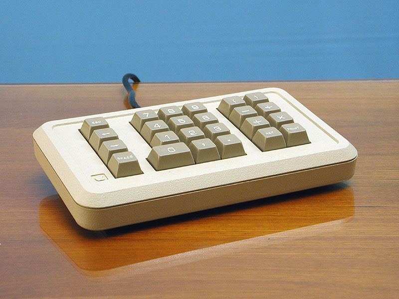 Angled image of the Numeric Keypad IIe resting on a table